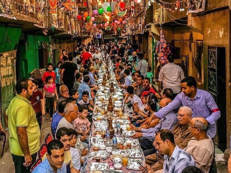 what countries celebrate ramadan | Iftar table in the streets of Cairo